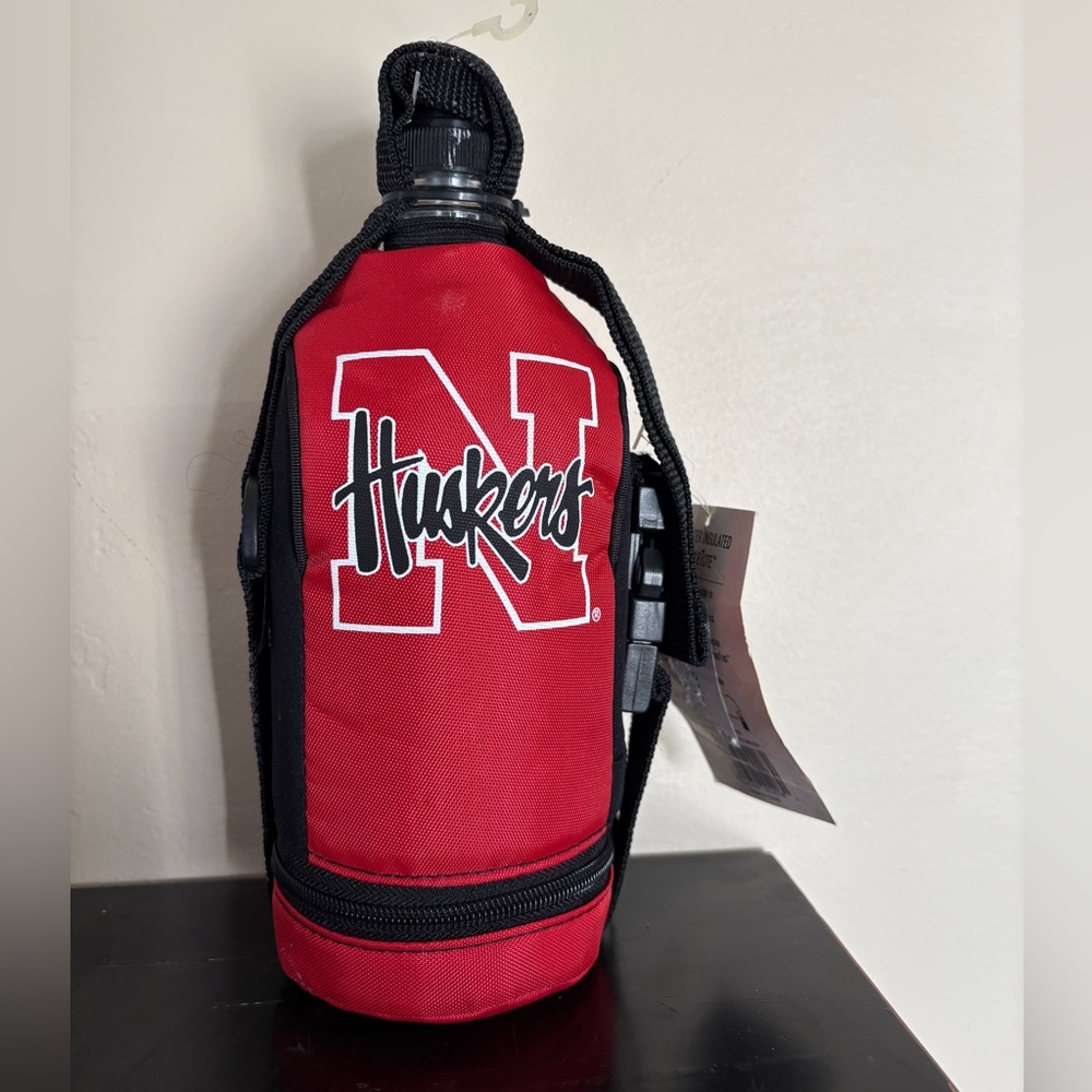 Nebraska Cornhuskers. Huskers football. Travel bottle bag with straps NWT
